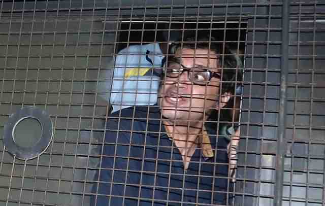 Arnab Goswami in a police van (Twitter)