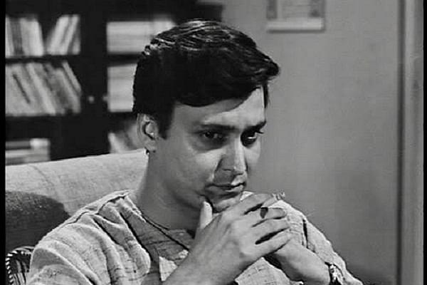 Soumitra Chatterjee playing the role of Feluda