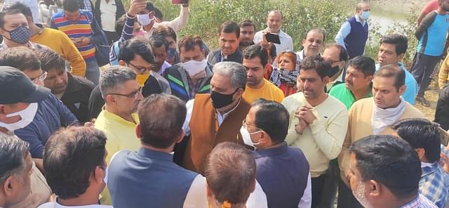 Family members of former councillor Harish Sharma and political leaders of the BJP, the Congress and other parties gathered at spot near the canal. (Source: Tribune India)