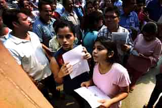  Students check NEET medical entrance exam results. (Raj K Raj/Hindustan Times via GettyImages)