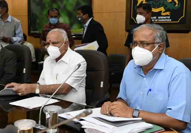 Karnataka Chief Minister B S Yediyurappa with Minister for Primary and Secondary Education S Suresh Kumar.