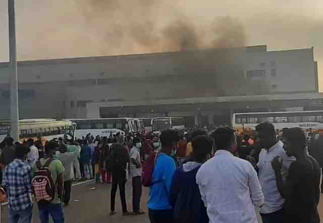 Smokes erupting out of Wistron facility. (Source: Express)