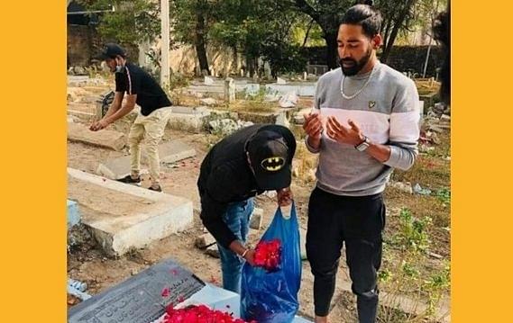 Mohammed Siraj offering prayers at his father's grave in Hyderabad (ANI)
