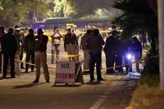 Investigators at the blast site near Israel embassy in Delhi (@AviBenlolo/Twitter)