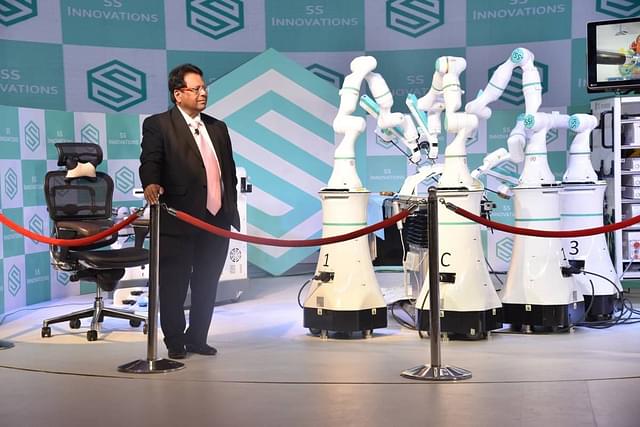 Dr Sudhir Srivastava and the SSI MANTRA robotic&nbsp; surgery system.