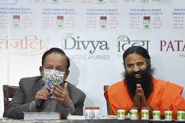 Dr Harsh Vardhan with Baba Ramdev (Pic via PTI)