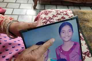 Ekta’s grandmother Sharda Devi shows her picture. (Picture clicked in Ludhiana on 16 February 2021).