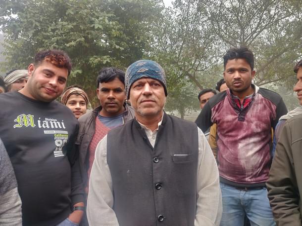 Umair Khan (wearing cap) with other villagers in Shabnam’s house.