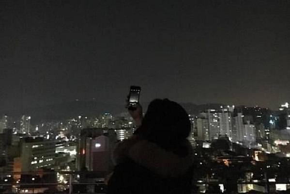 A woman capturing the night skies.
