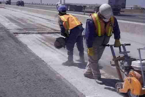 Workers on the highway.&nbsp;