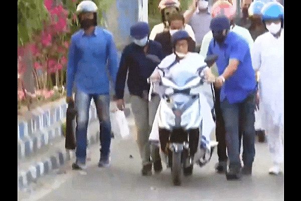 Mamata Banerjee on E-Scooter (ANI)