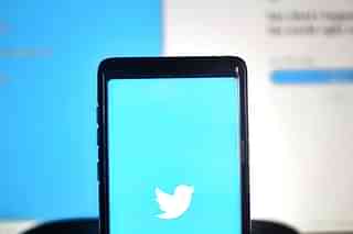 Twitter on smartphone (Unsplash) 