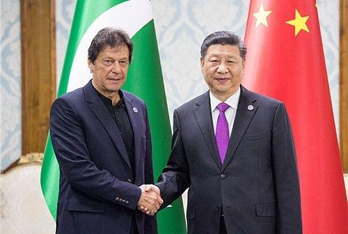 Pakistan Prime Minister Imran Khan with Chinese President Xi Jinping&nbsp;