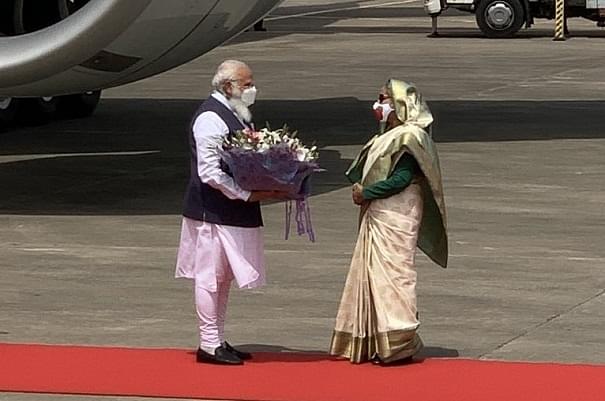 Bangladesh PM Sheikh Hasina receiving PM Modi at Dhaka airport (PMO India)