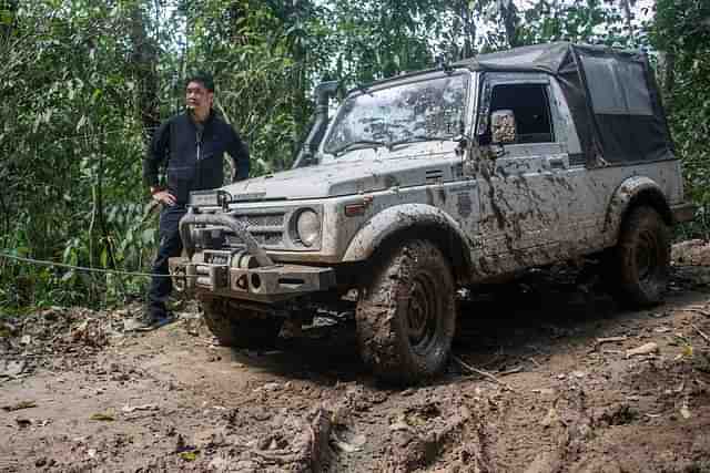 Pema Khandu outside his jeep