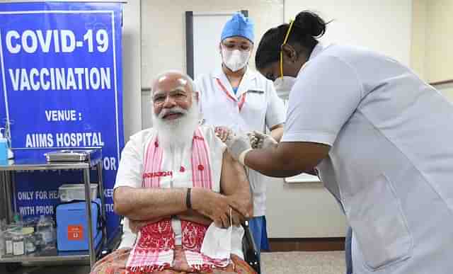 PM Modi getting vaccinated against Covid-19 at AIIMS (Pic Via Twitter)