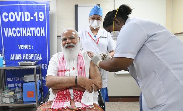 PM Modi receives his vaccination against Covid-19. (Pic Via Twitter)