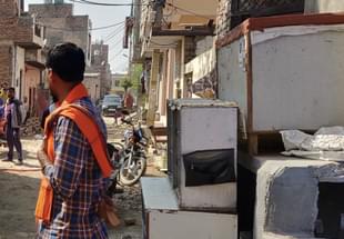 Aditya in saffron stole.