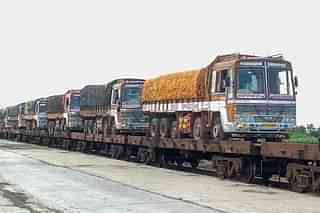 Indian Railway’s Roll-On-Roll-Off service carrying trucks. (@rajtoday/Twitter)