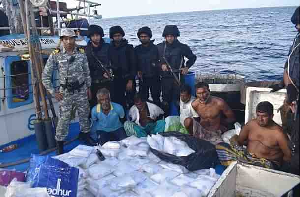 Indian Navy personnel with intercepted narcotic haul (@ShivAroor/Twitter)