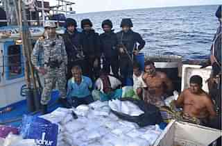 Indian Navy personnel with intercepted narcotic haul (@ShivAroor/Twitter)