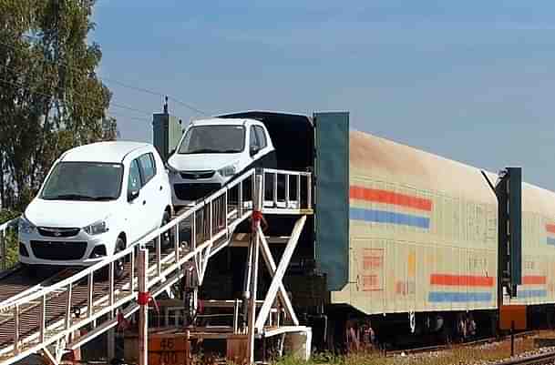 Cars transported through specially designed train (Ministry of Railways)