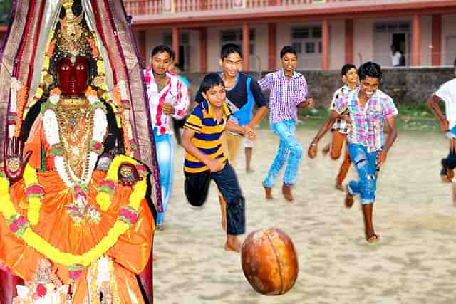  The goddess and children, right, playing Polali Chendu.