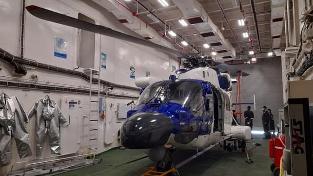 Helicopter inside the hanger.