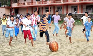 Children playing Polali Chendu