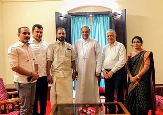 K Surendran With Bishop Rev Fr Peter Paul Saldanha of Mangalore Diocese