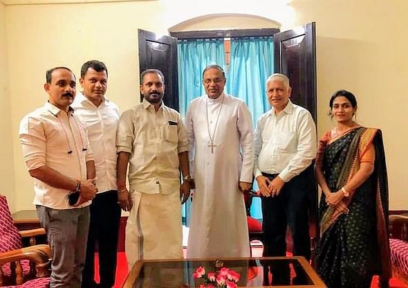 K Surendran With Bishop Rev Fr Peter Paul Saldanha of Mangalore Diocese