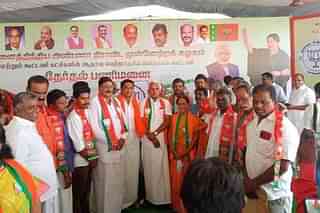 Prof P Kanagasabapathi and Dr C Saraswathi with the party workers. 