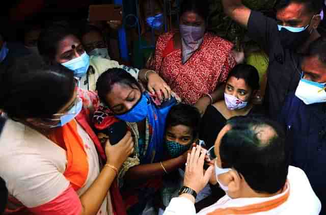 BJP President J P Nadda meets the family of a BJP worker killed in post-poll violence in West Bengal.&nbsp; (JP Nadda/Twitter)