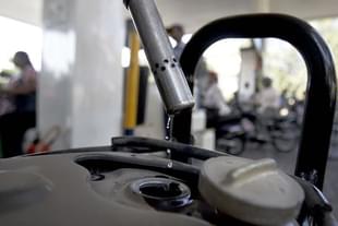 Bikers fill petrol on a fuel station in Kandivali near Mumbai. (Prasad Gori/Hindustan Times via GettyImages)