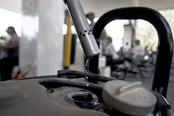 Bikers fill petrol on a fuel station in Kandivali near Mumbai. (Prasad Gori/Hindustan Times via GettyImages)