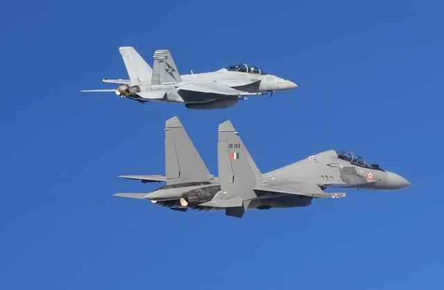 Indian Su-30 MKI flies with an Australian F-18 Hornet at Exercise Pitch Black 2018. (Livefist)