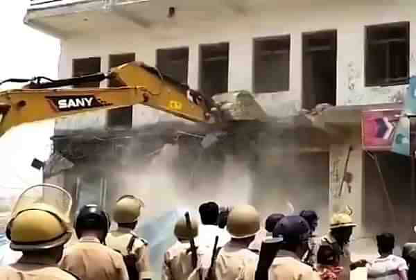 Etah district administration and police demolishing illegal properties (via Twitter)