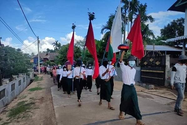 People of a village in Myanmar protesting against the military dictatorship and its atrocities.