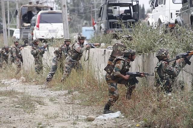 

Rashtriya Rifles soldiers take positions during an attack by terrorists on the outskirts of Srinagar. Representative image.(Waseem Andrabi/Hindustan Times via GettyImages)  