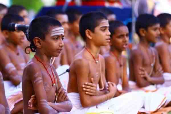 (Young scholars chanting at a meet - photo by Arya Samajam)