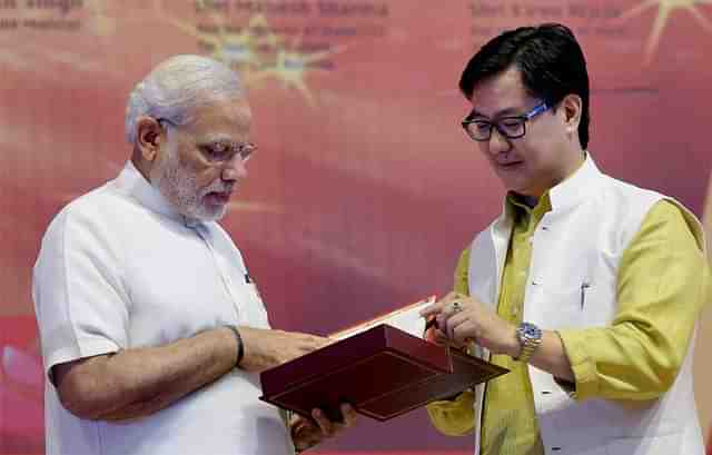 Prime Minister Narendra Modi with Union Minister Kiren Rijiju.