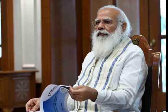 PM Modi at the review meeting (Pic Via PIB website)