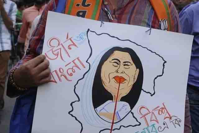 A protest rally against TMC violence. (Samir Jana/Hindustan Times via Getty Images)