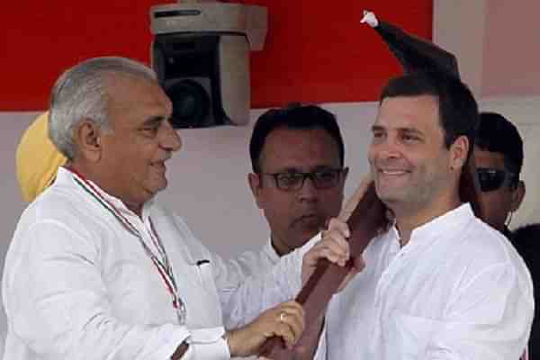 Bhupinder Singh Hooda and Rahul Gandhi.