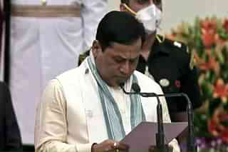 Sarbananda Sonowal taking oath as a minister. 