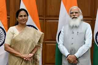 PM Modi and Shoba Karandlaje 