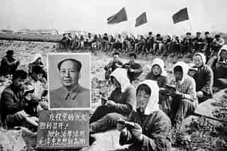 Chinese peasants gather in May 1969 in a field in Hungching region around a huge portrait of Chinese communist leader Mao Zedong (Credit: Flicker/ @manhhai)