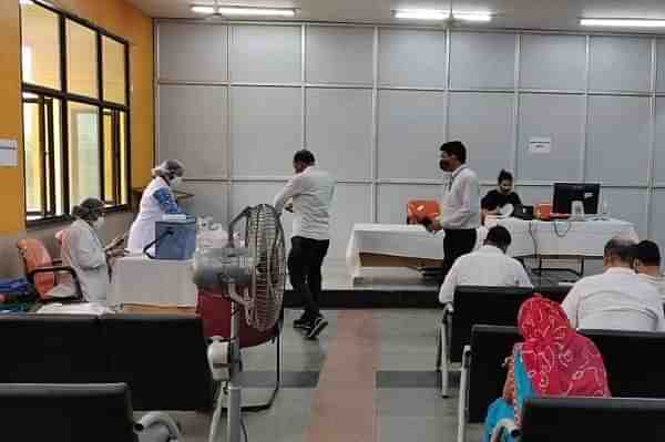 A vaccination drive for railway employees at New Delhi railway station.