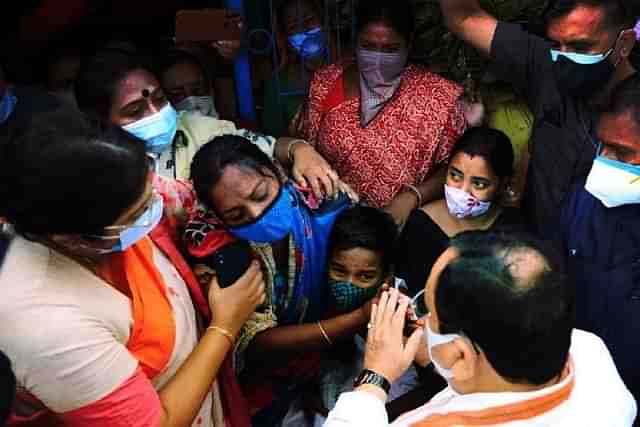 BJP President J P Nadda meets the family of a BJP worker killed in post-poll violence in West Bengal.  (JP Nadda/Twitter)