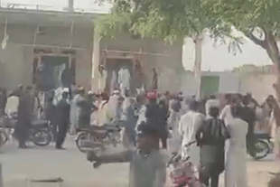 Mob attacking the temple (Pic Via Twitter)